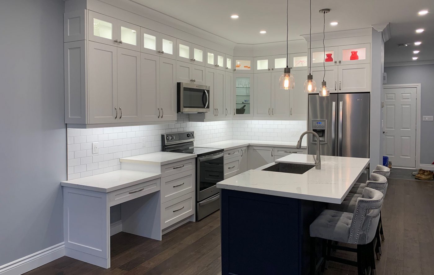 a kitchen interior with custom cabinetry