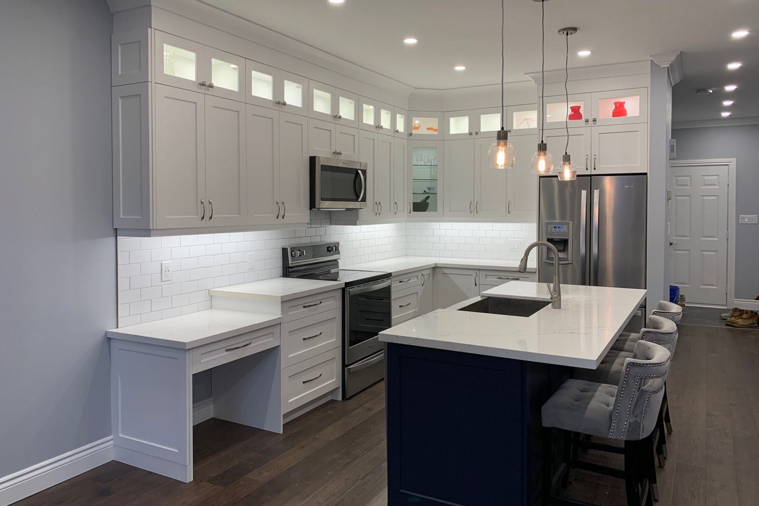 a kitchen interior with custom cabinetry