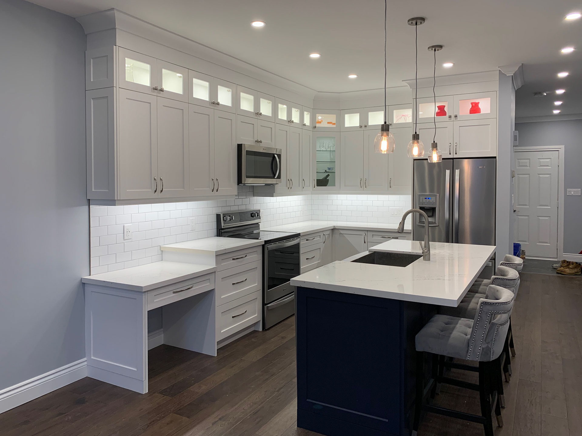 a kitchen interior with custom cabinetry
