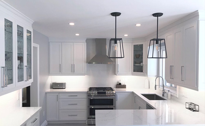 a kitchen interior with custom cabinetry by morra fine cabinetry